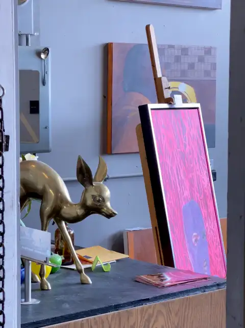 Where brass deer meet neon dreams and hidden art.